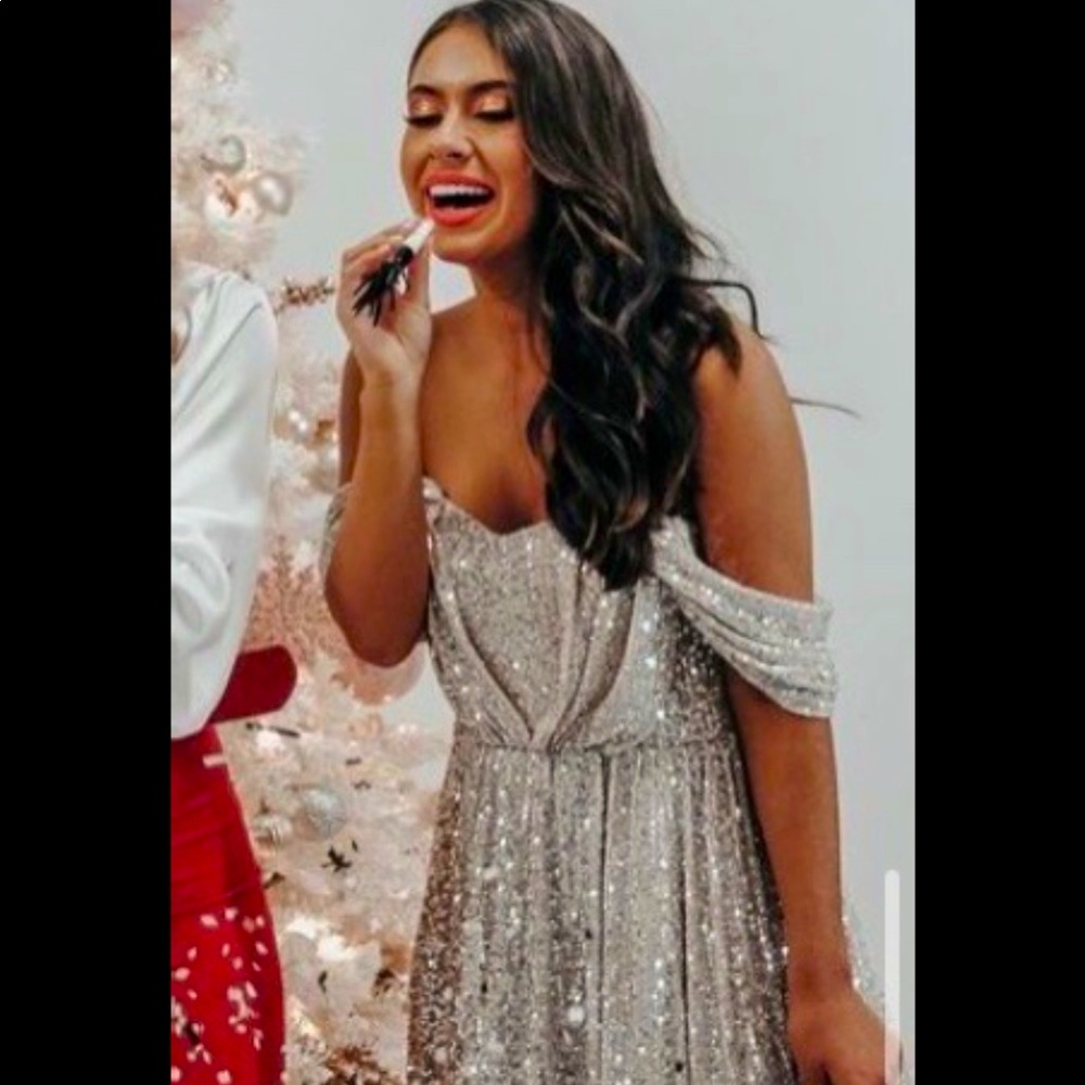 Hope’s silver sequin dress